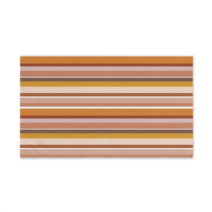 Decorative towel with horizontal striped pattern on a white background