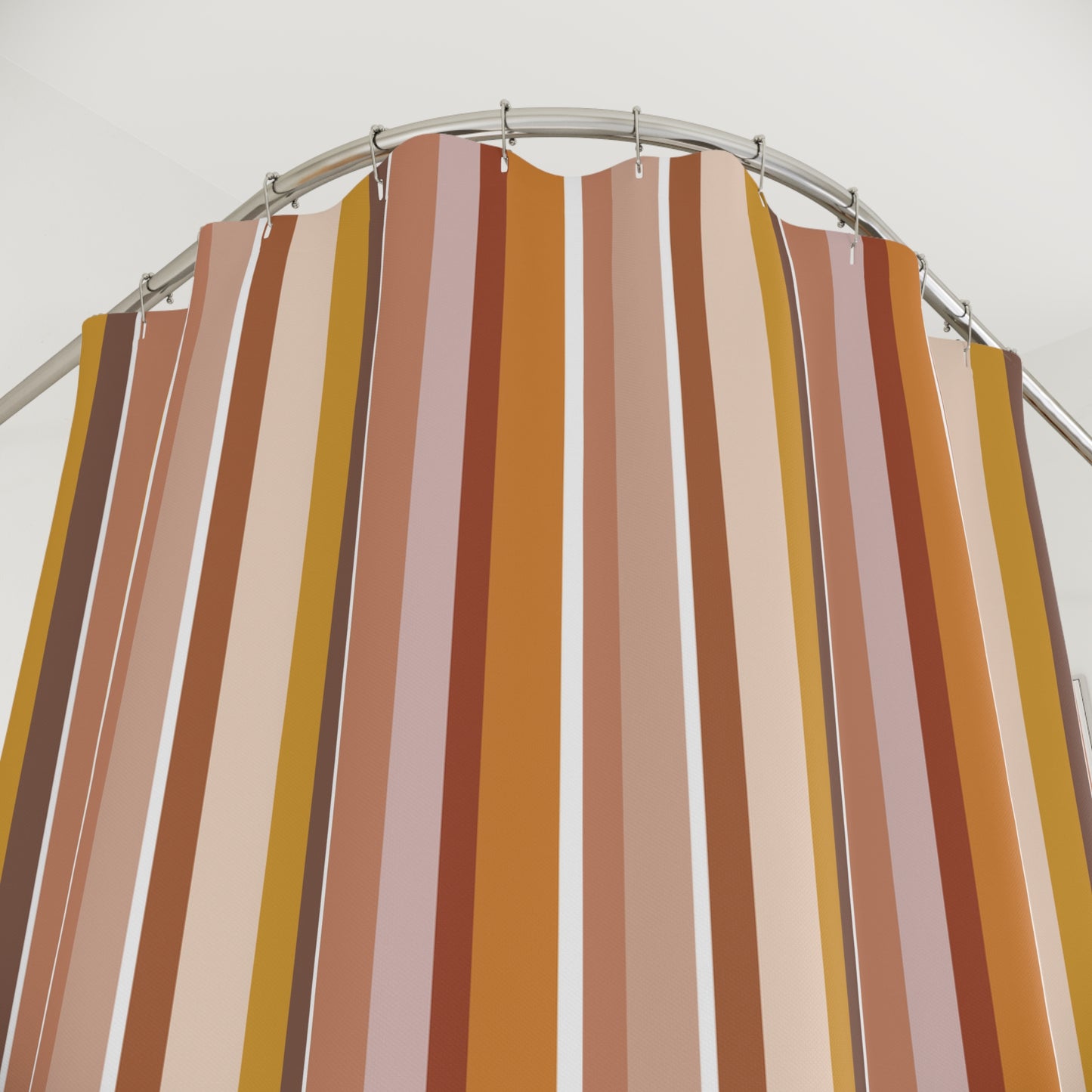 Striped shower curtain with brown, beige, and yellow vertical stripes on a white background