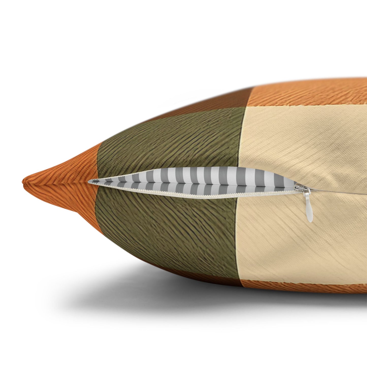 Color-blocked pillow with zipper on a white background