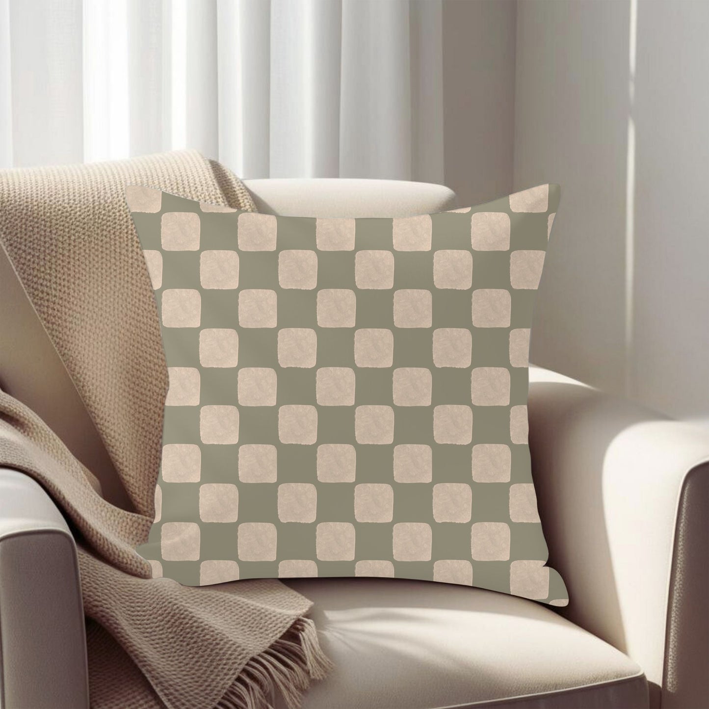 Checkered pillow on a chair with a neutral background
