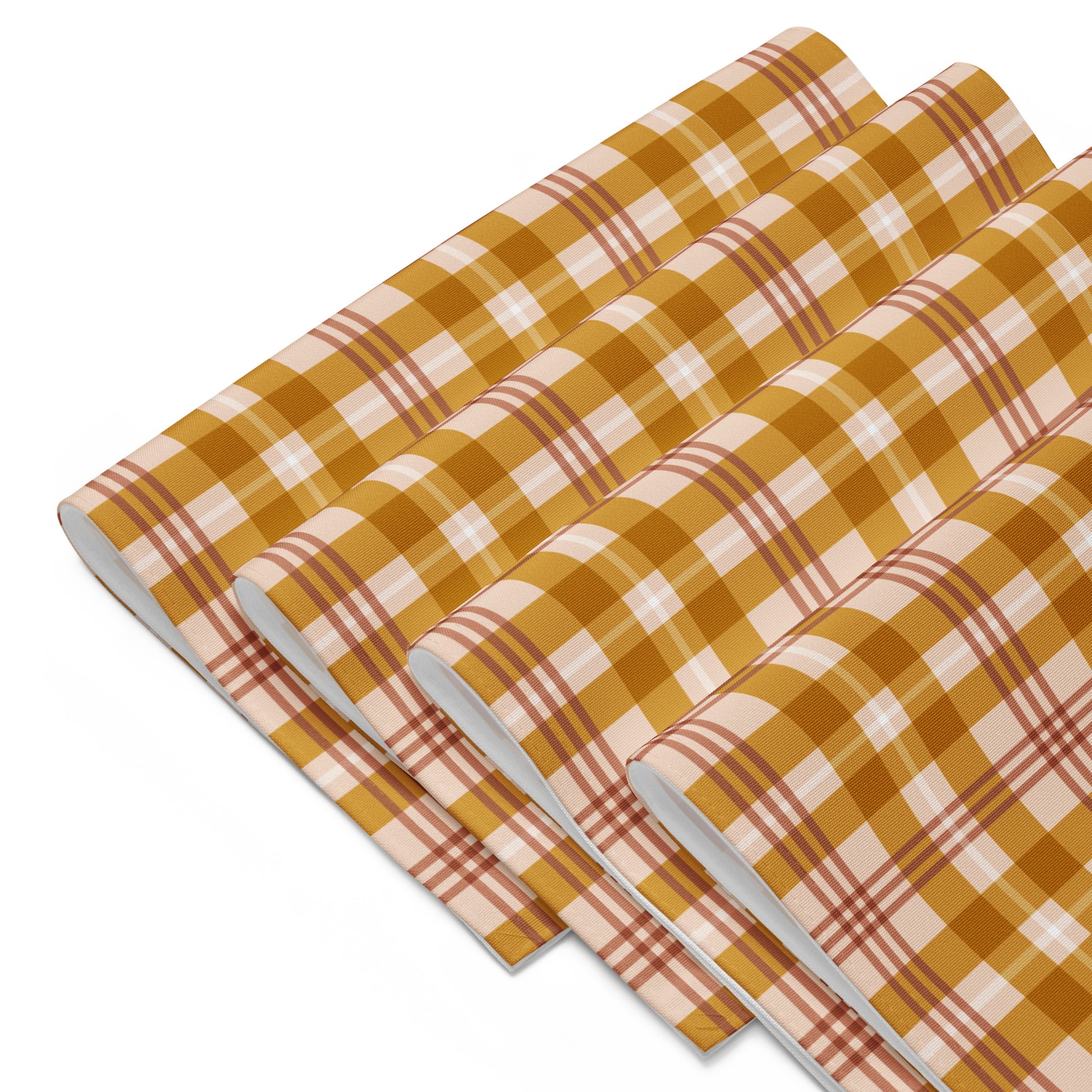 Cultural dining linens including African print napkins, placemats, and table runners.