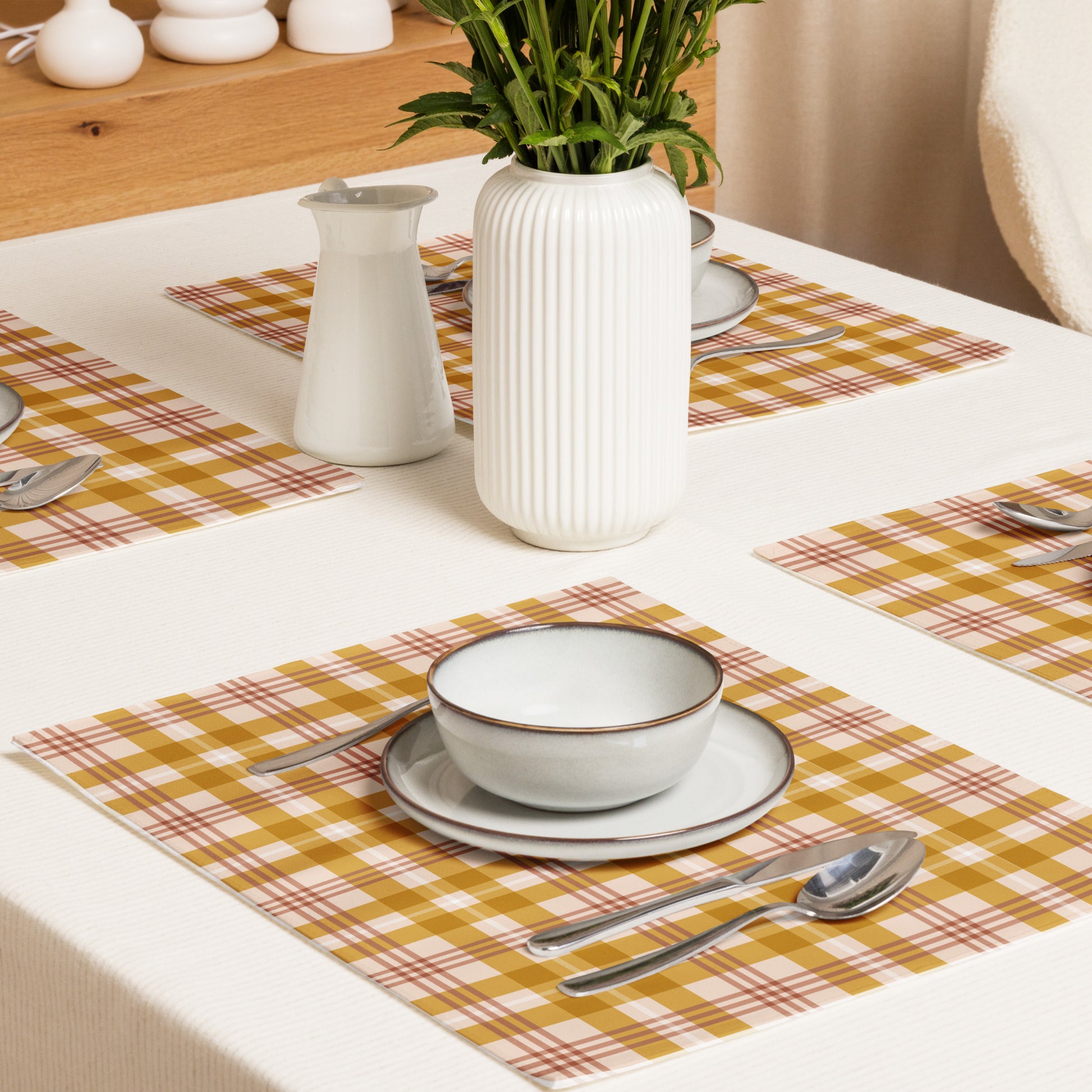 Cultural dining linens including African print napkins, placemats, and table runners.