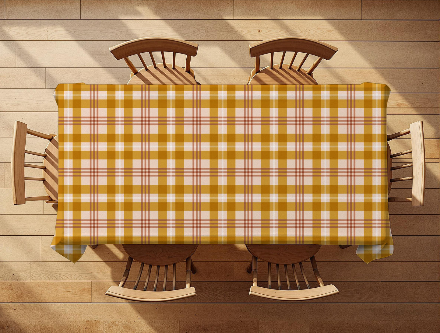 Yellow and white checkered tablecloth on a wooden table with four chairs.