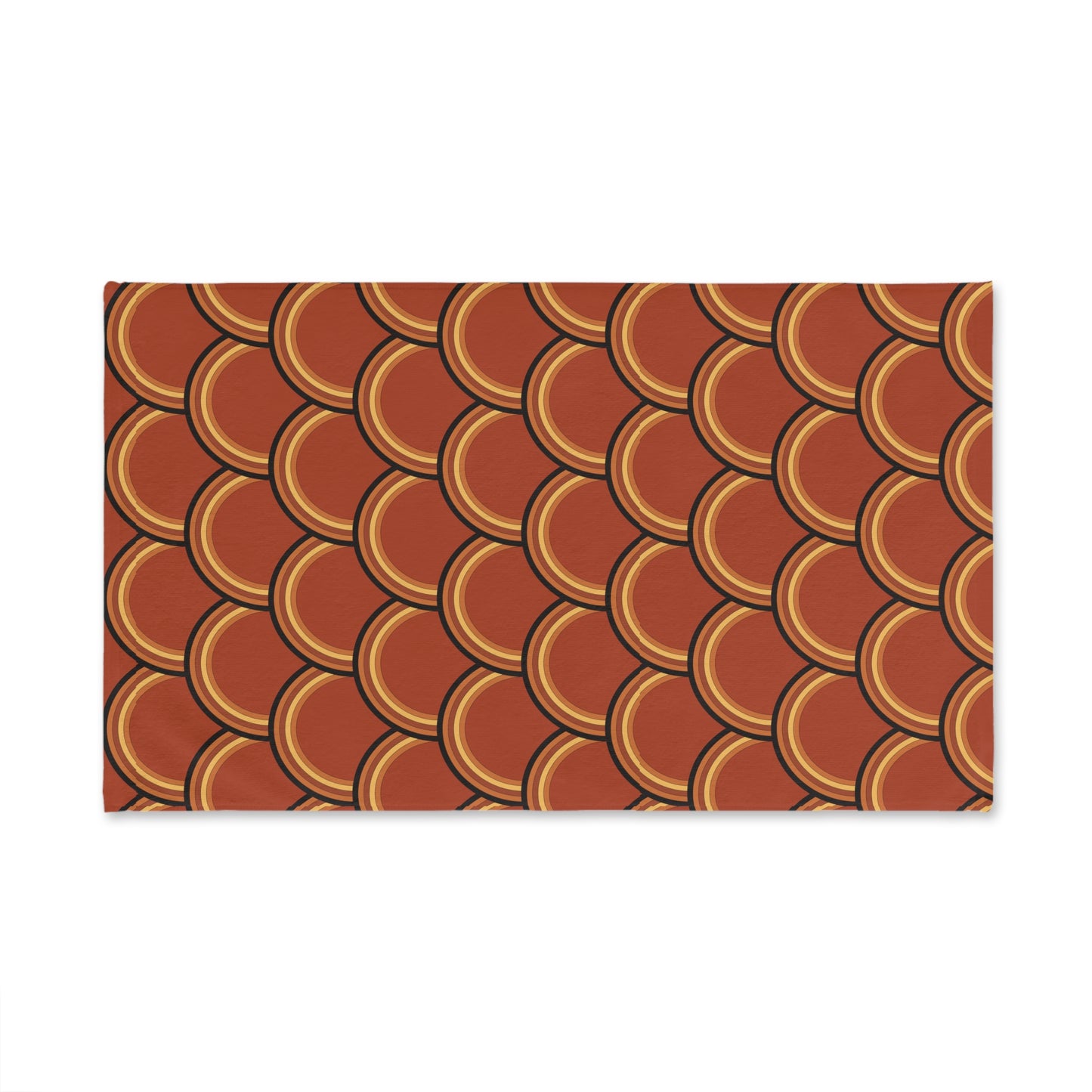 Rectangular towel with a brown and gold circular pattern on a white background