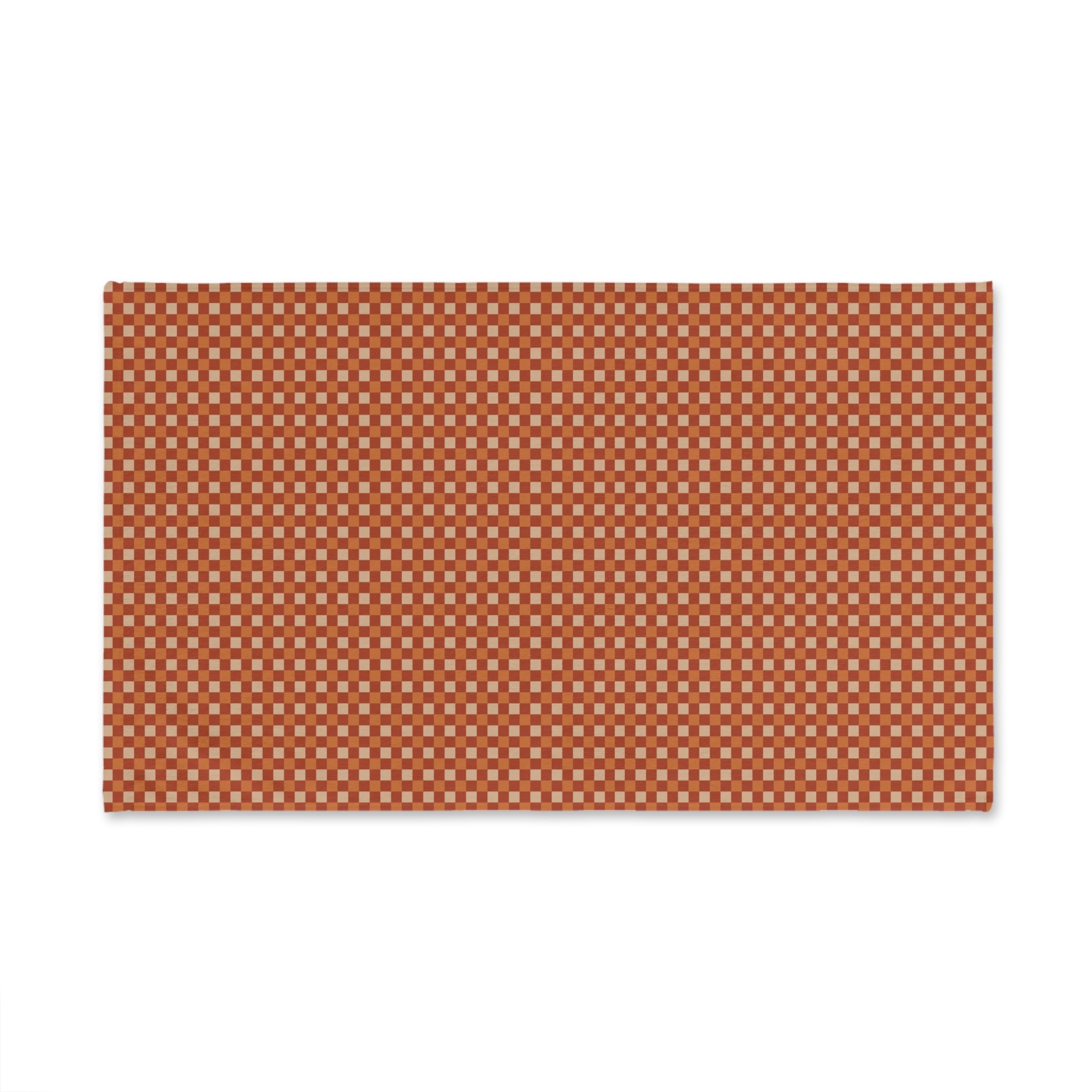 Decorative towel with a red and white checkered pattern on a white background