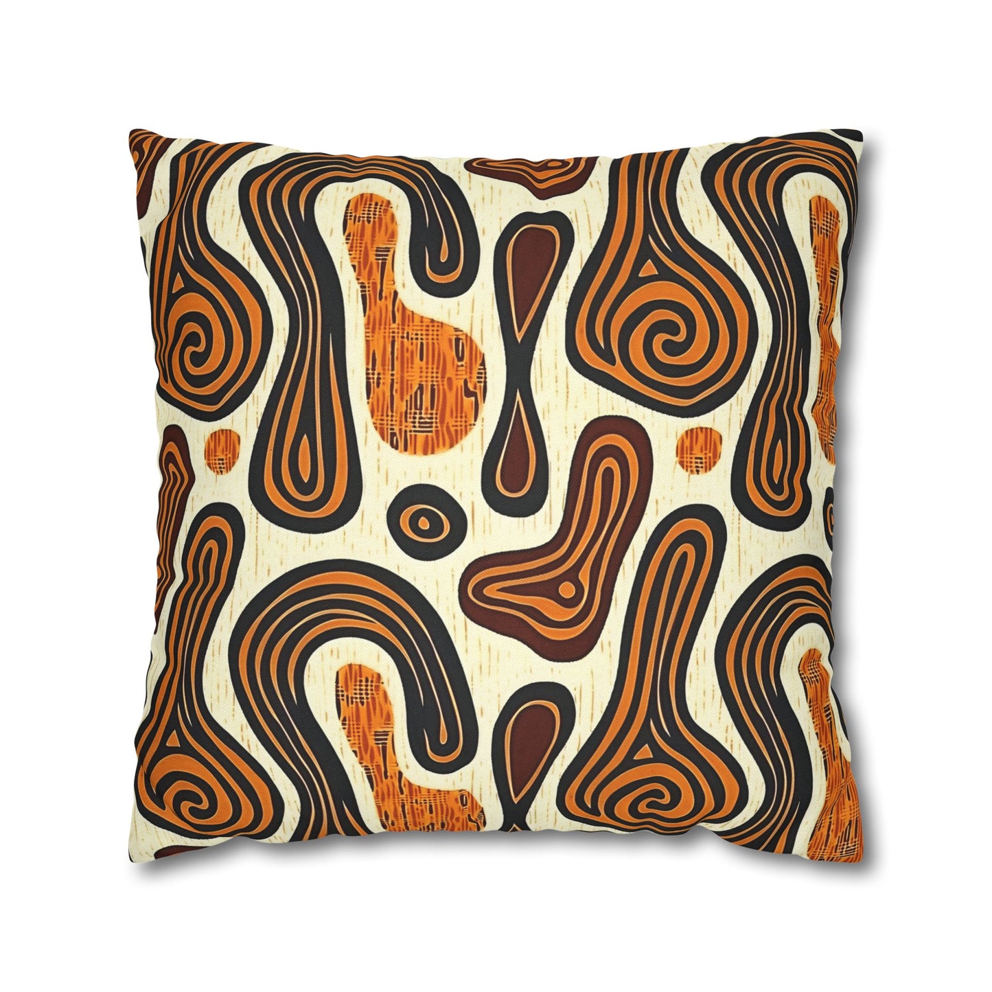 A set of decorative pillow covers with a tribal ethnic print, displayed on a colorful rug alongside a orange cushion.