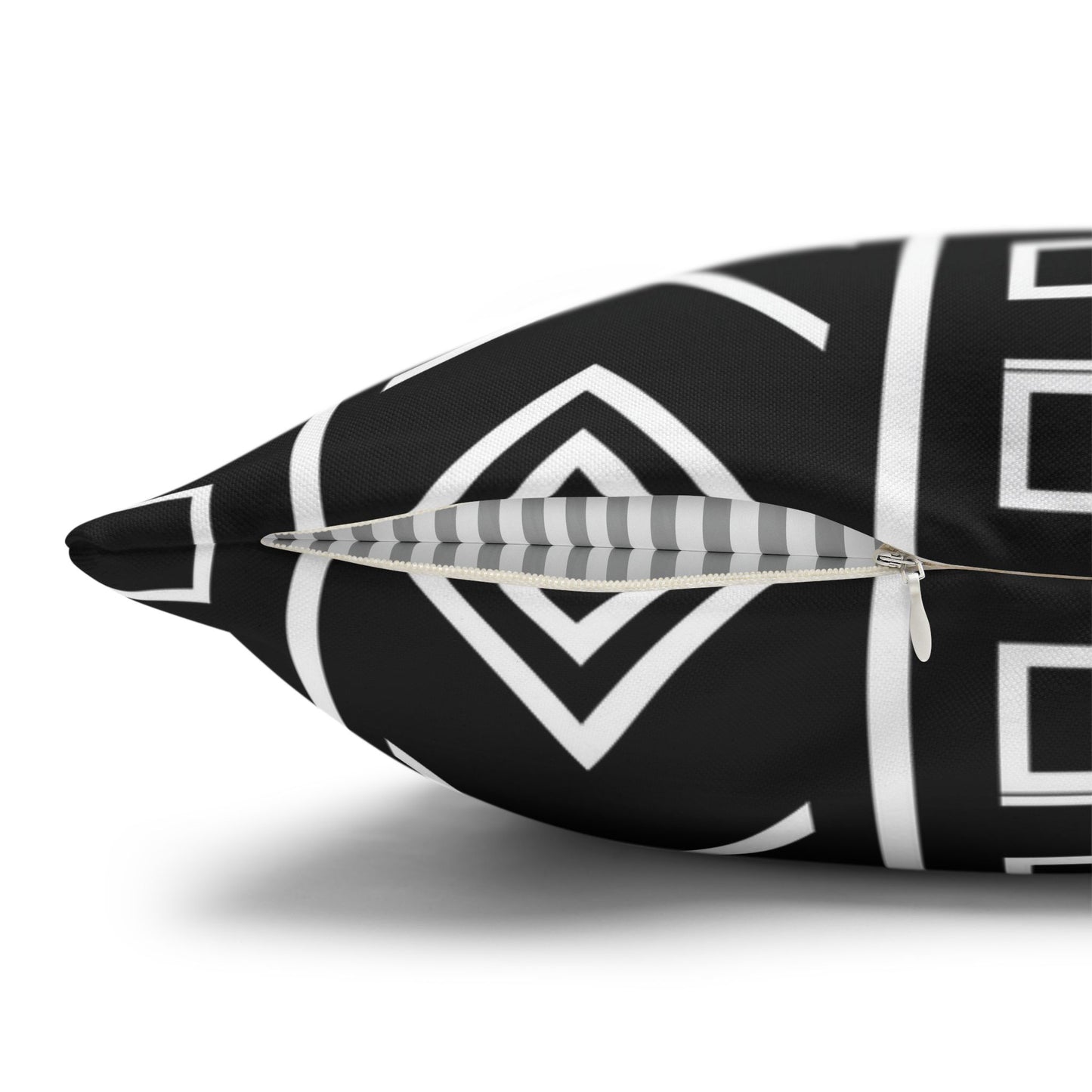 Decorative pillow with geometric pattern on a white background