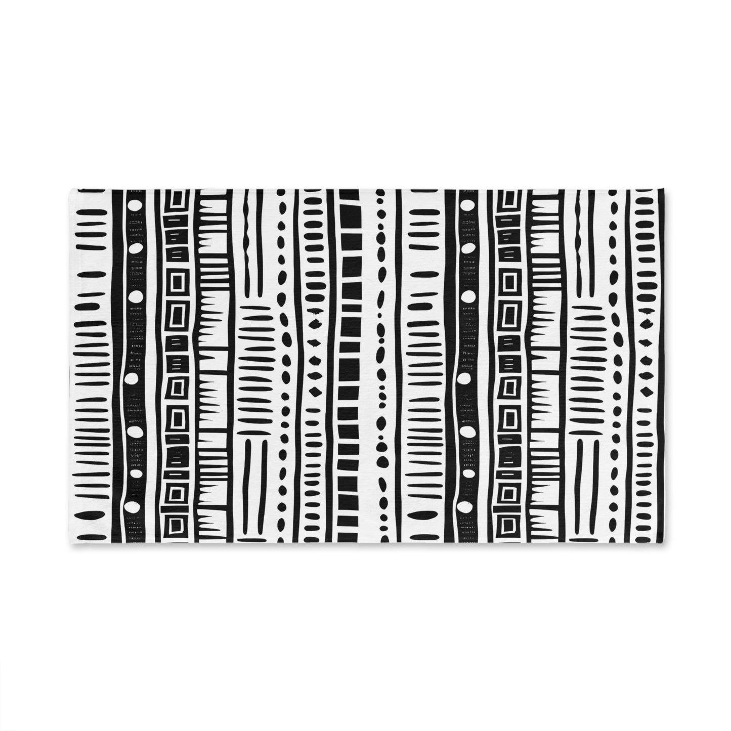 Black and white patterned towel on a white background