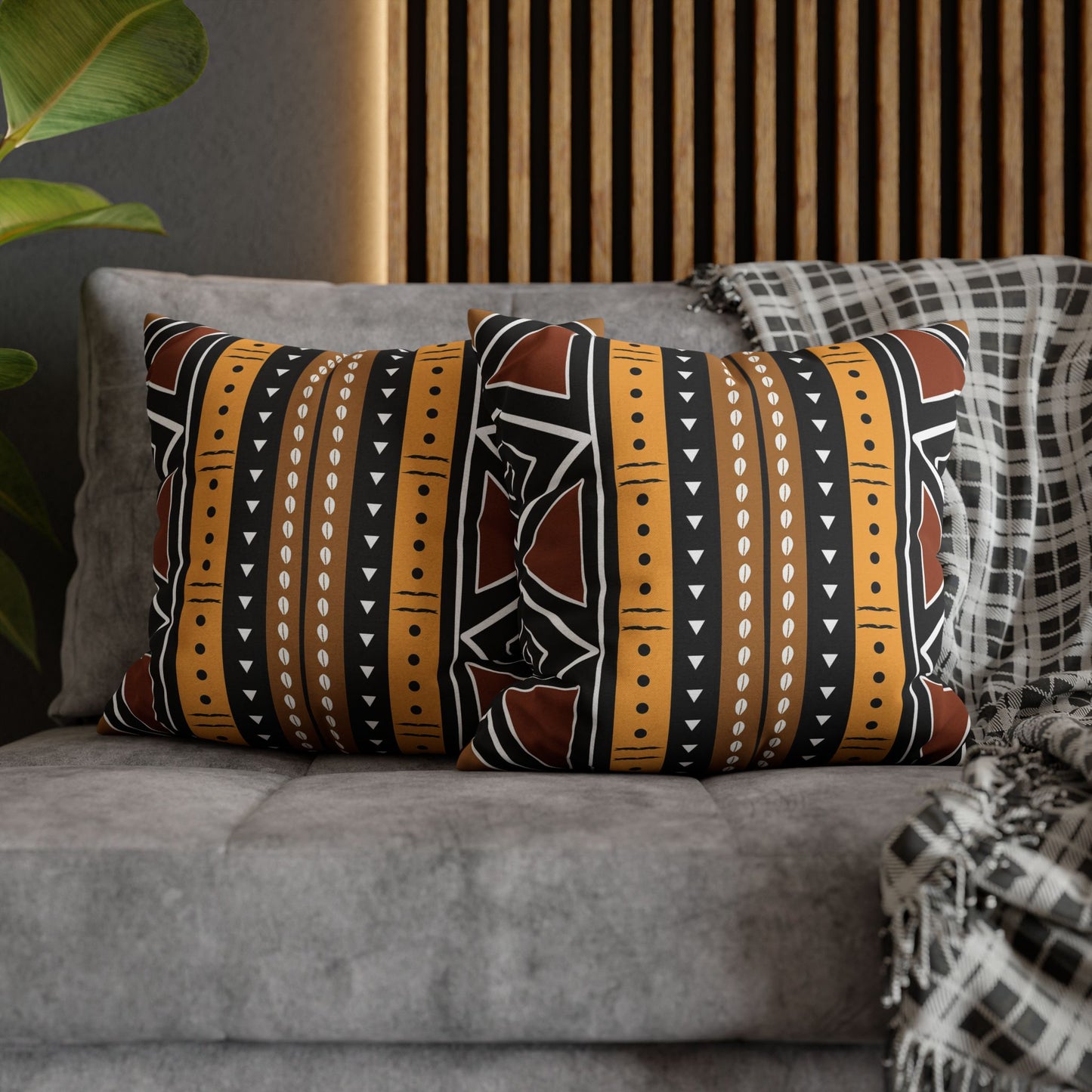 African Print  pillow with tribal pattern on a gray sofa