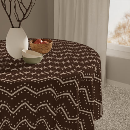 Cultural print tablecloth styled with napkins and placemats