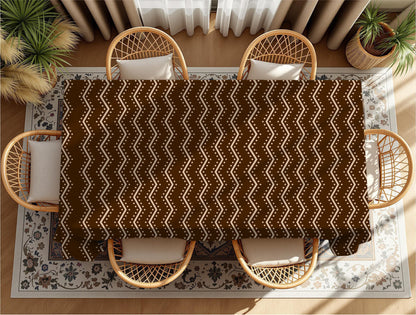Cultural print tablecloth styled with napkins and placemats