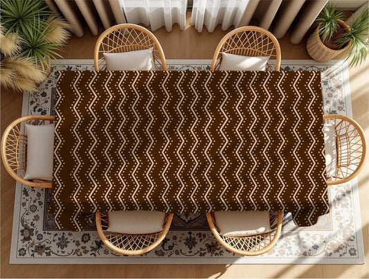 Cultural print tablecloth styled with napkins and placemats