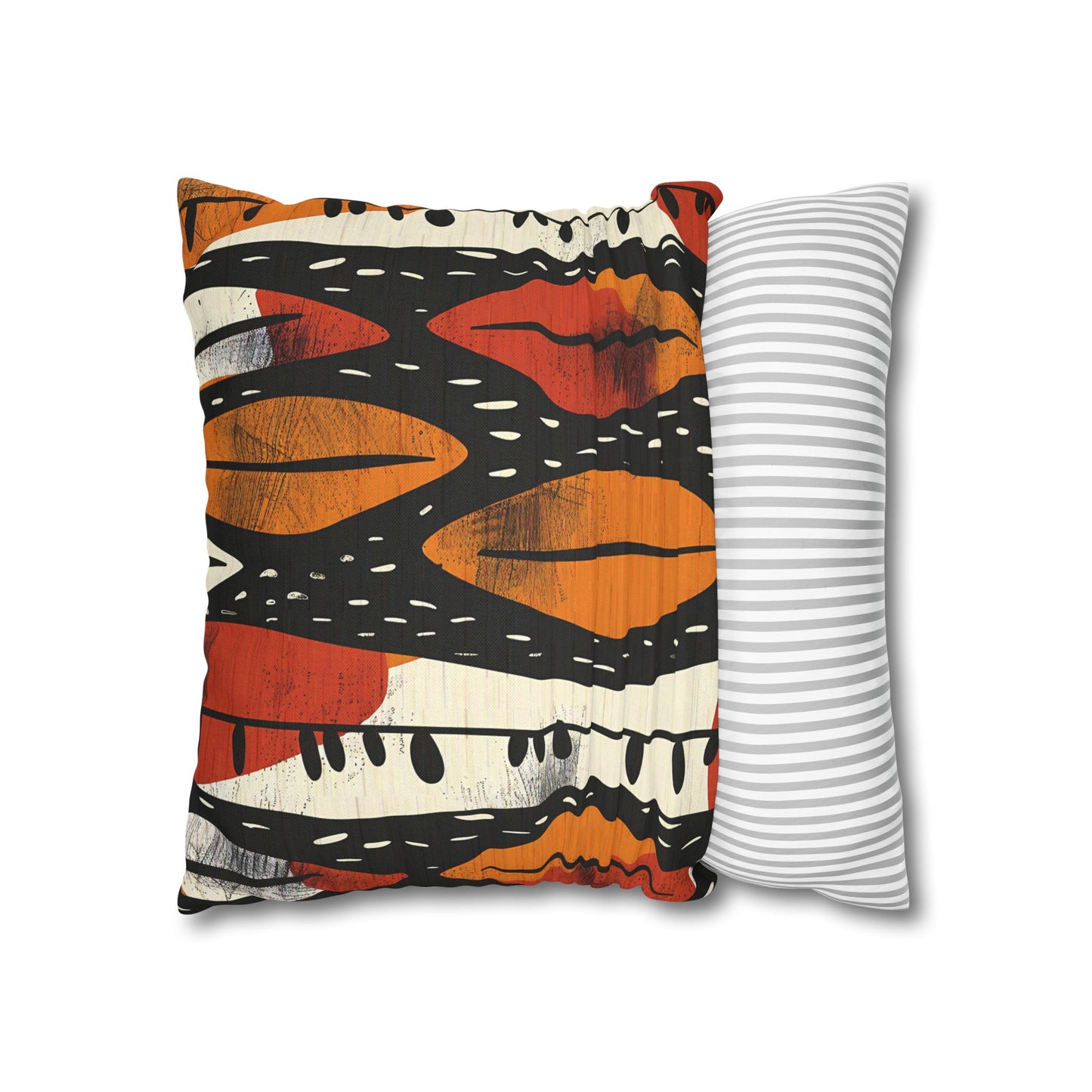 Two pillows, one with a colorful abstract pattern and the other with a white and gray striped pattern, on a white background.
