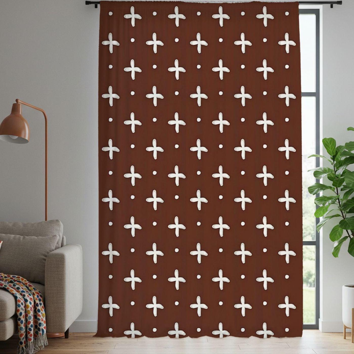 Brown curtain with white geometric pattern in a living room setting