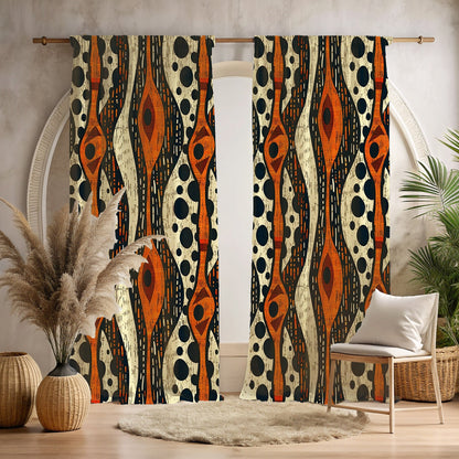 A set of African tribal print window curtains in an interior setting, featuring geometric patterns in beige, black, and orange.