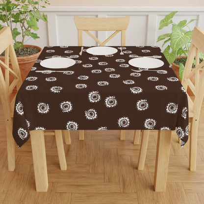 Cultural print tablecloth styled with napkins and placemats