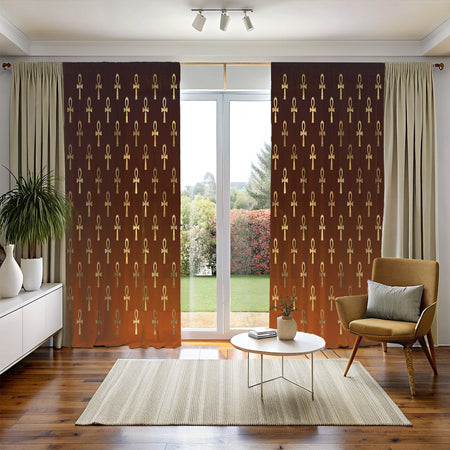 A pair of brown Egyptian cross window curtains with a geometric pattern, hanging in a room with a window, a chair, and a rug.