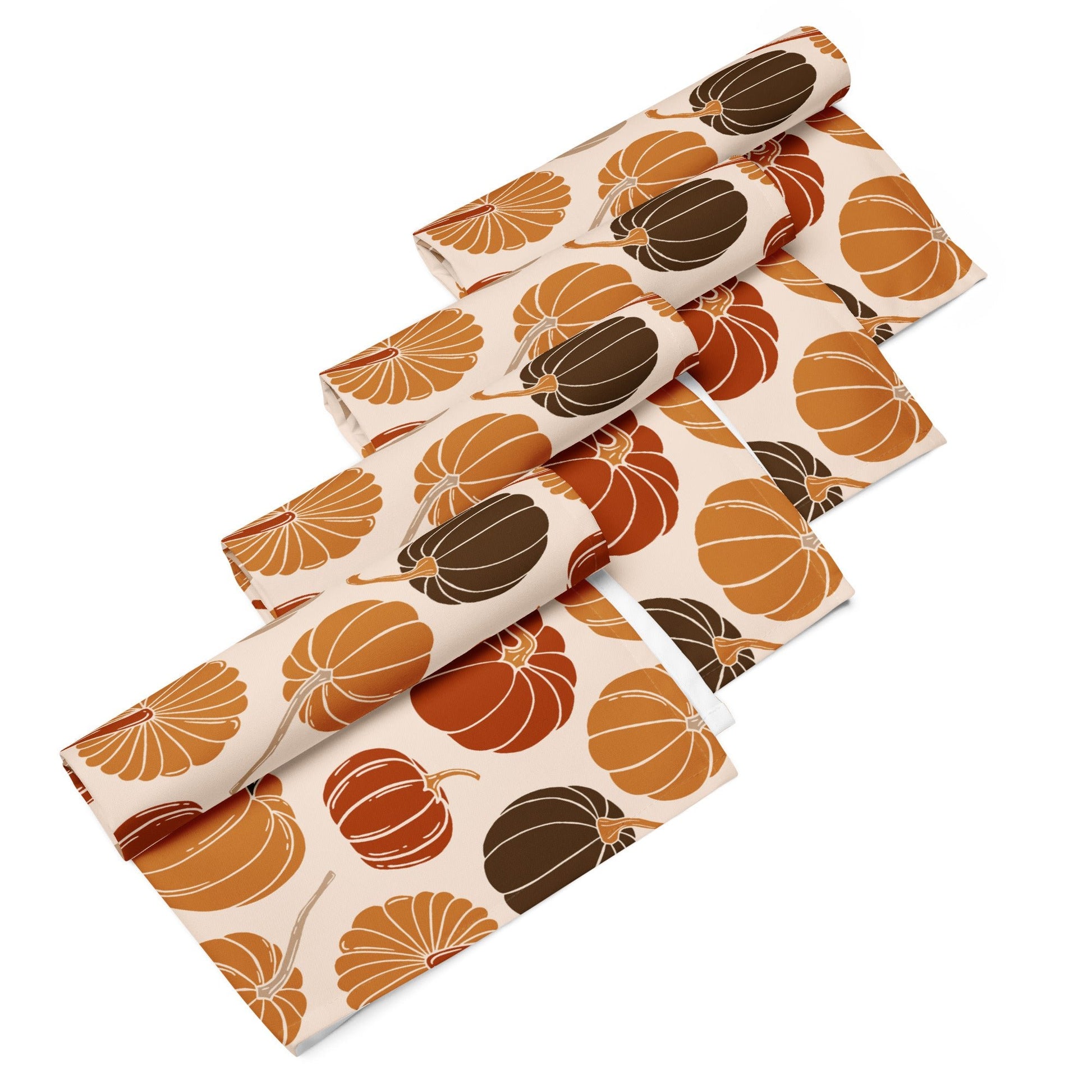 Set of four napkins with pumpkin pattern on a white background
