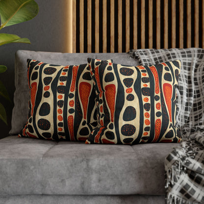 A blue cushion cover with a geometric tribal pattern on a chair, 