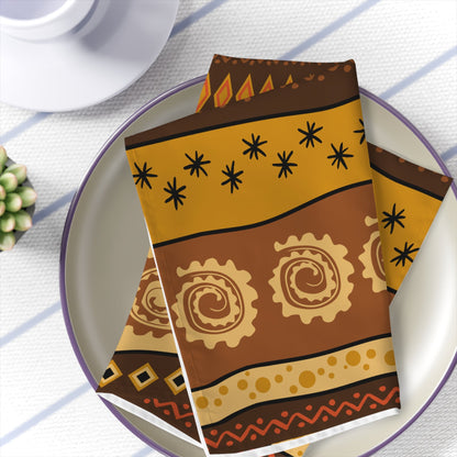 Cultural dining linens including African print napkins, placemats, and table runners.