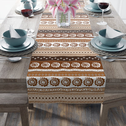 Cultural dining linens including African print napkins, placemats, and table runners.